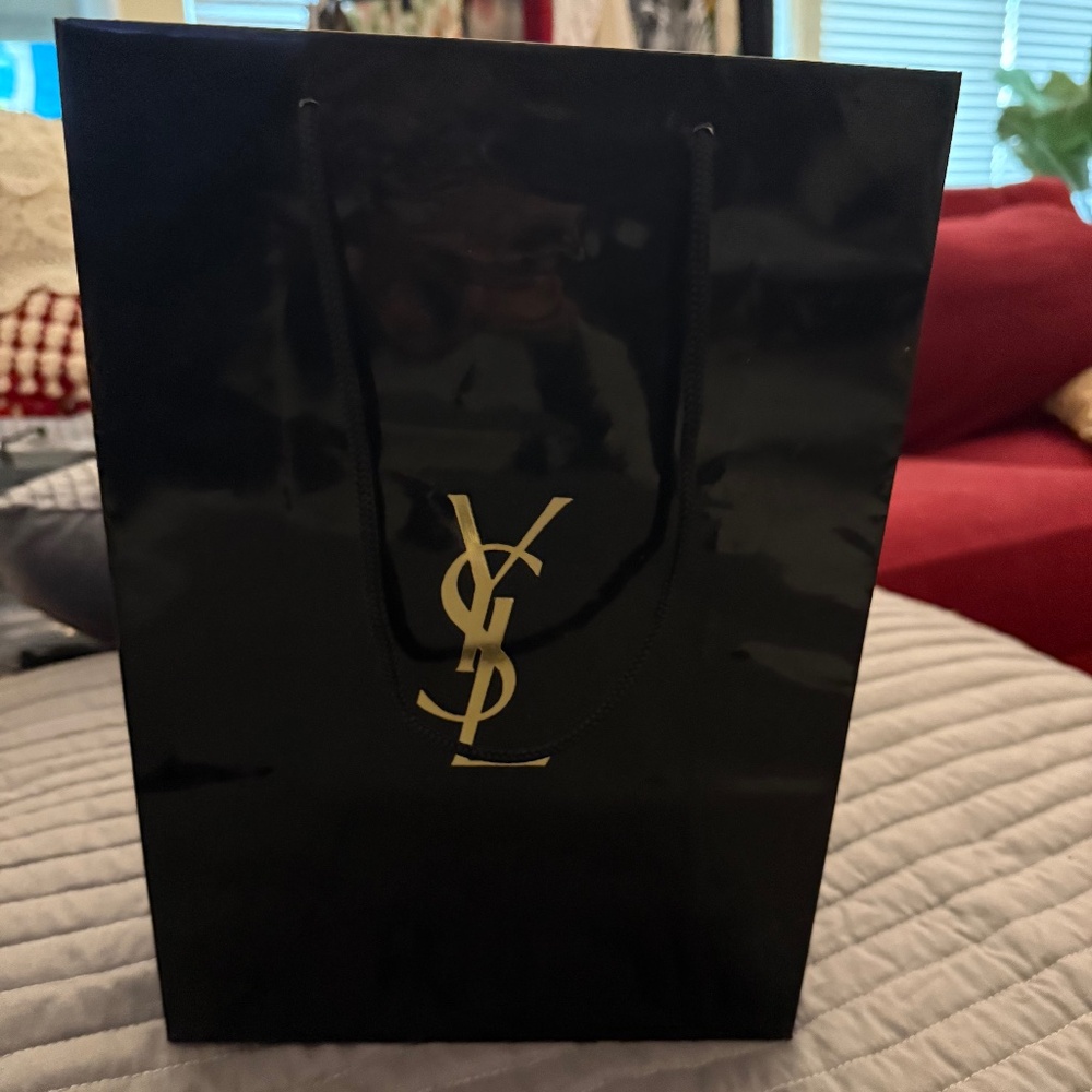 YSL, THE DESIGNER GROUP OF THE YEAR.  GET THEIR BAG